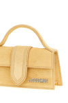 the jacquemus le bambino handbag defines a structured trapezoidal silhouette