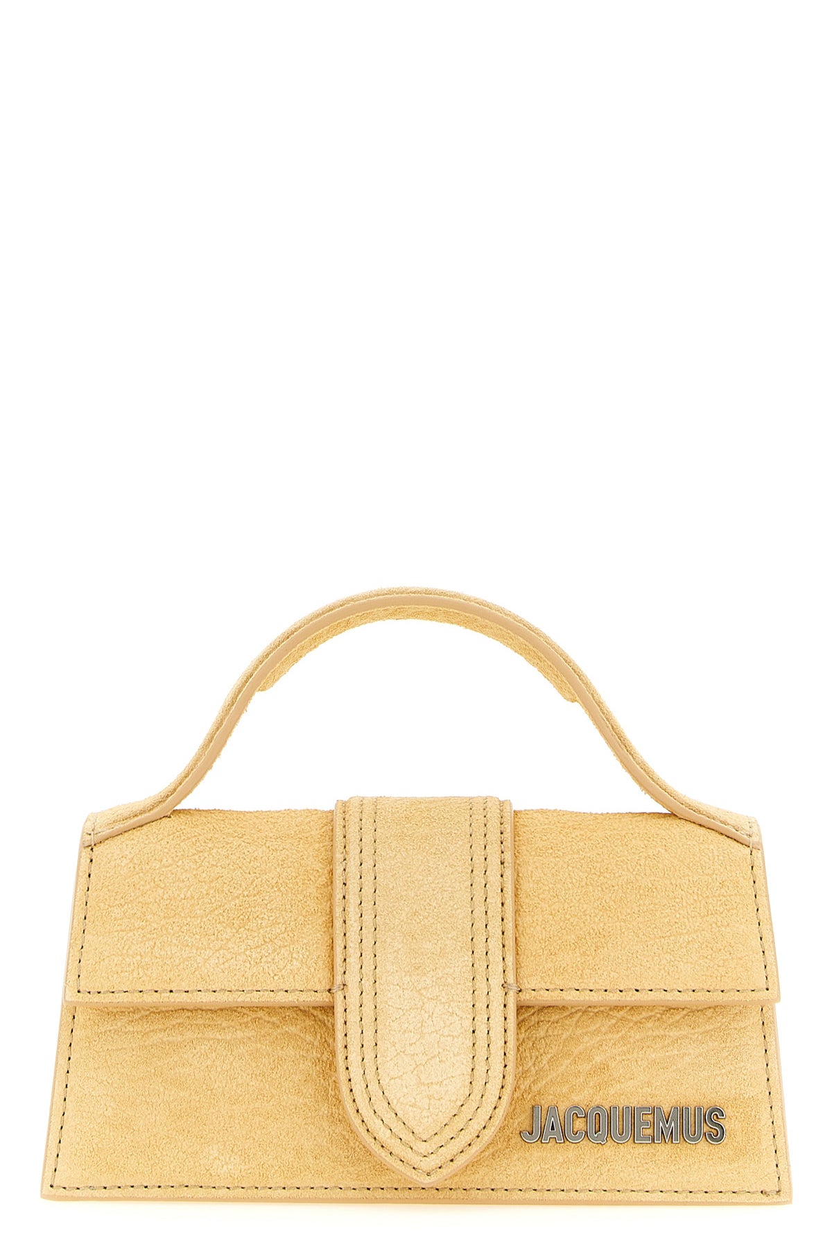 the jacquemus le bambino handbag defines a structured trapezoidal silhouette
