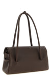 the jacquemus le turismo long shoulder bag redefines classic proportions throu