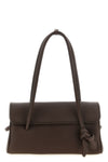 the jacquemus le turismo long shoulder bag redefines classic proportions throu