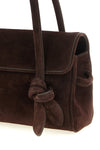 the jacquemus le turismo long shoulder bag stands out for its elongated silhou