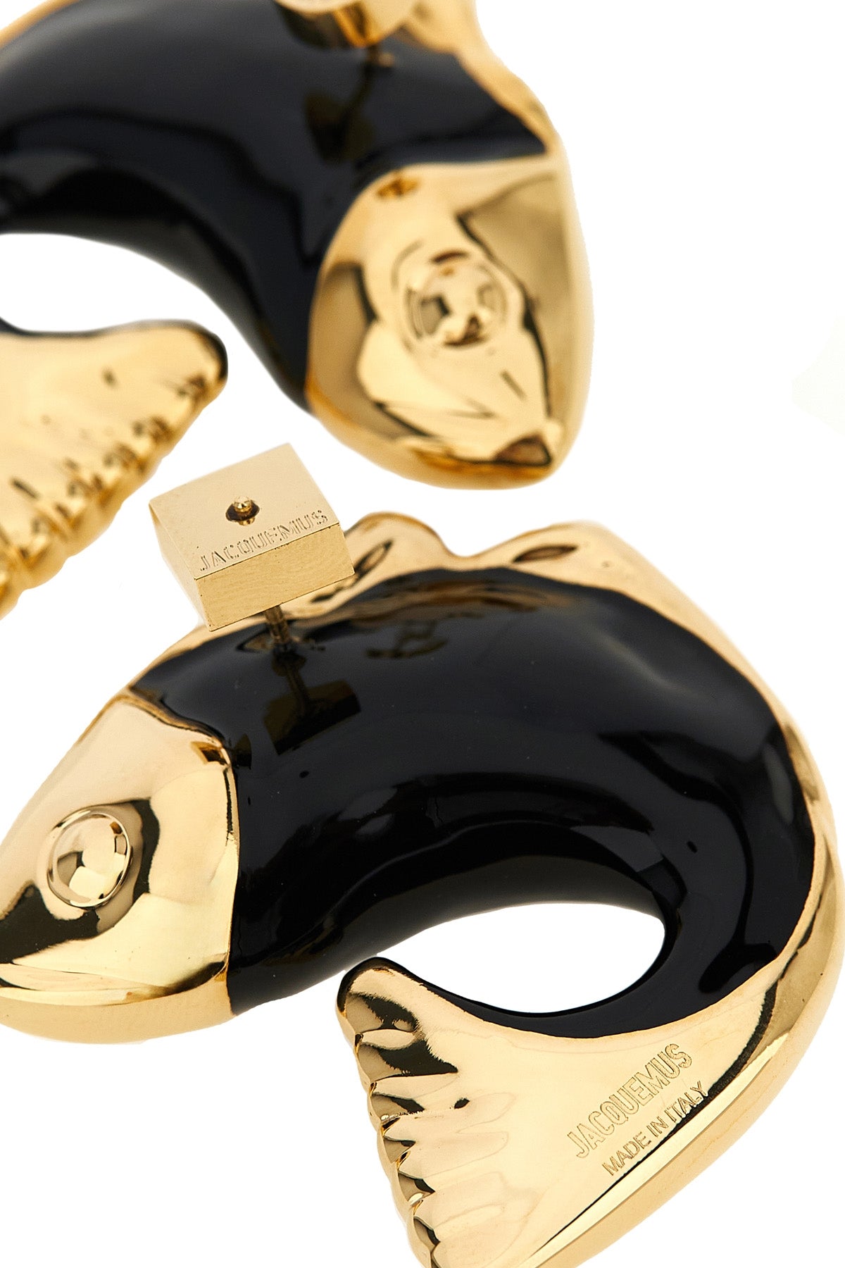 the jacquemus les boucles poisson earrings feature a distinctive sculptural si