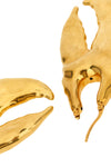 the jacquemus les boucles homard earrings feature a sculptural structure in th