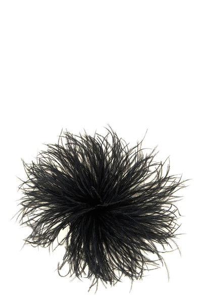 the gianluca capannolo brooch stands out for its scenographic volume and an impa