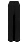 claudia gianluca capannolo trousers redefine everyday elegance through a fluid a