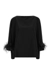 the gianluca capannolo laura blouse redefines the volumes of the contemporary