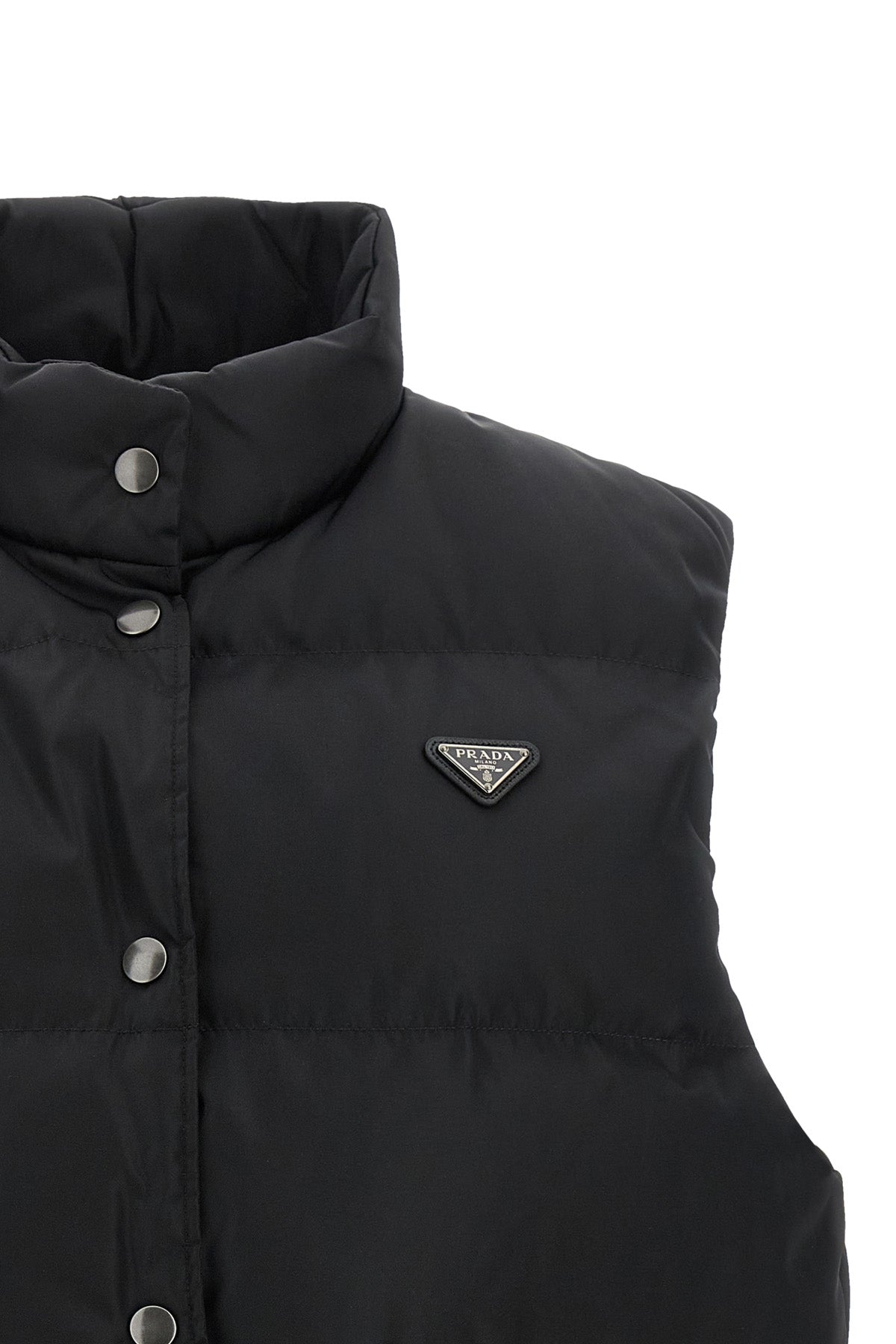 the prada black re-nylon vest redefines the codes of outerwear through a technic