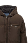 prada re-nylon down jacket redefines the codes of outerwear through an oversized