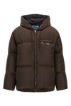 prada re-nylon down jacket redefines the codes of outerwear through an oversized