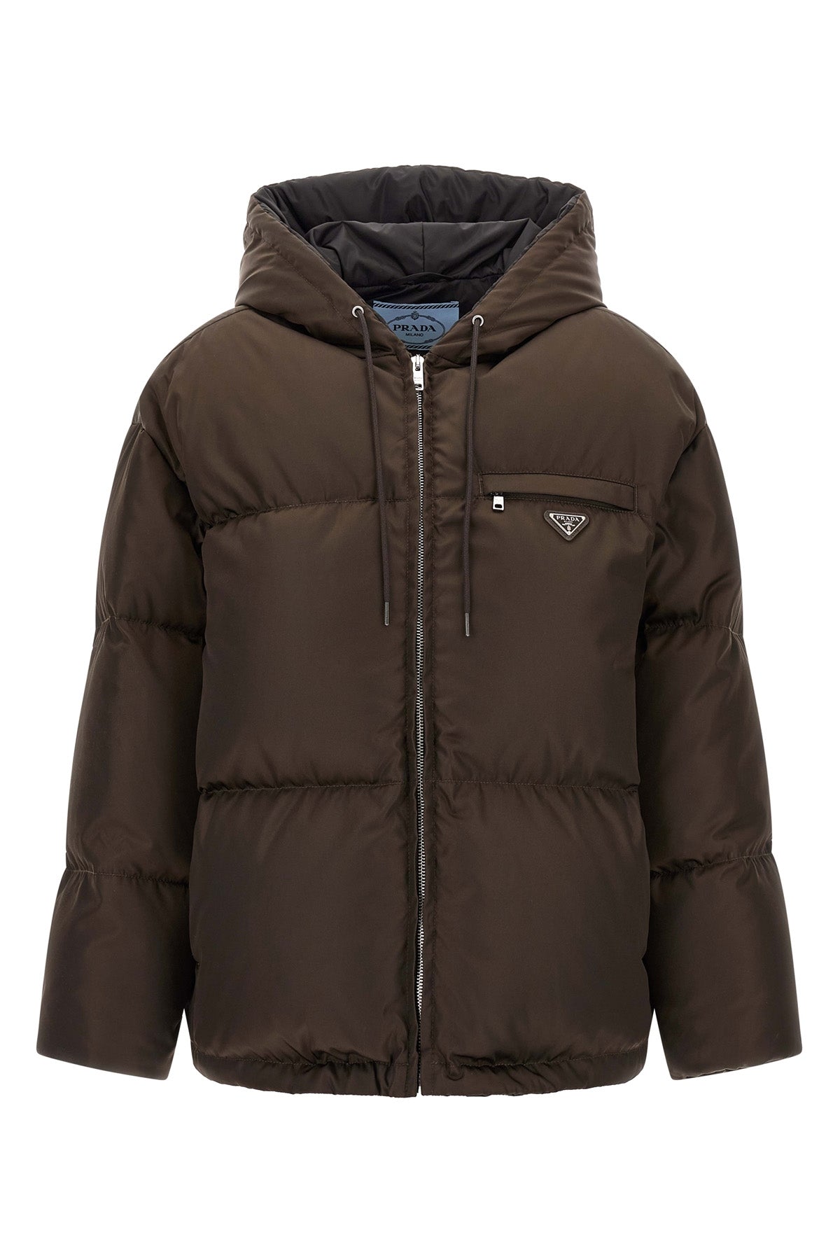 prada re-nylon down jacket redefines the codes of outerwear through an oversized