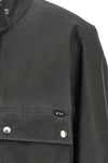 the prada jacket in structured technical fabric redefines the volumes of contemp