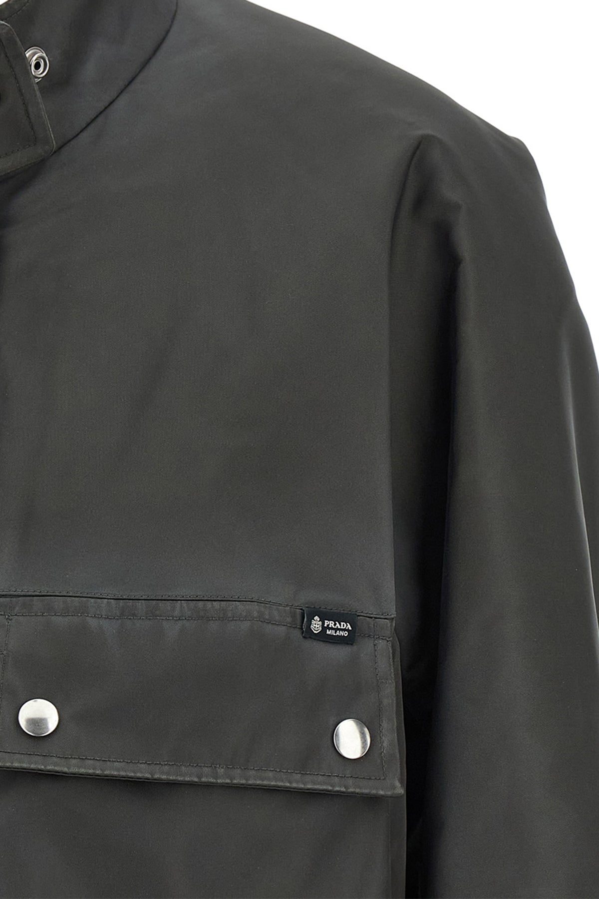 the prada jacket in structured technical fabric redefines the volumes of contemp