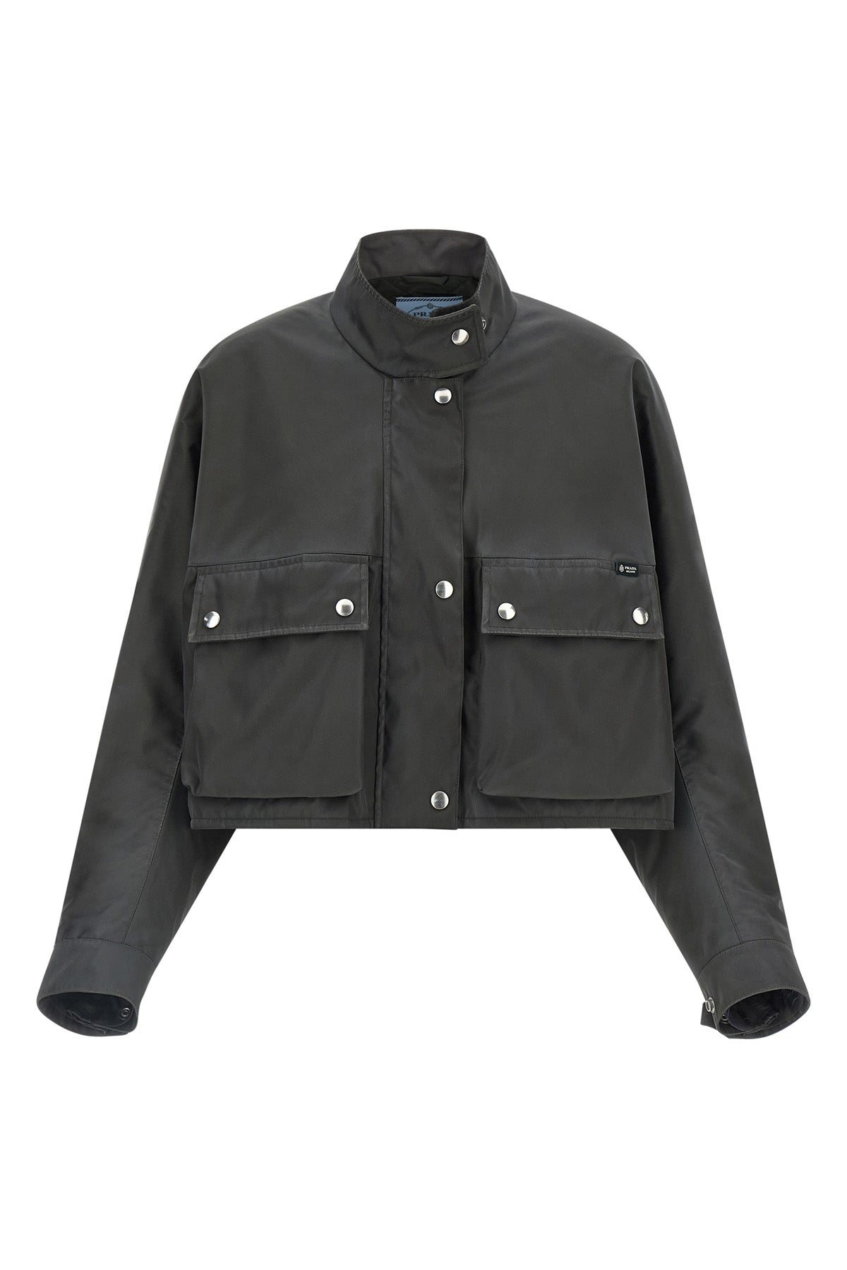 the prada jacket in structured technical fabric redefines the volumes of contemp