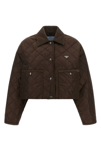 prada cropped blouson defines a new functional aesthetic through compact volumes