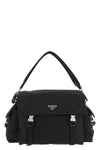 the prada explore shoulder bag in iconic black re-nylon