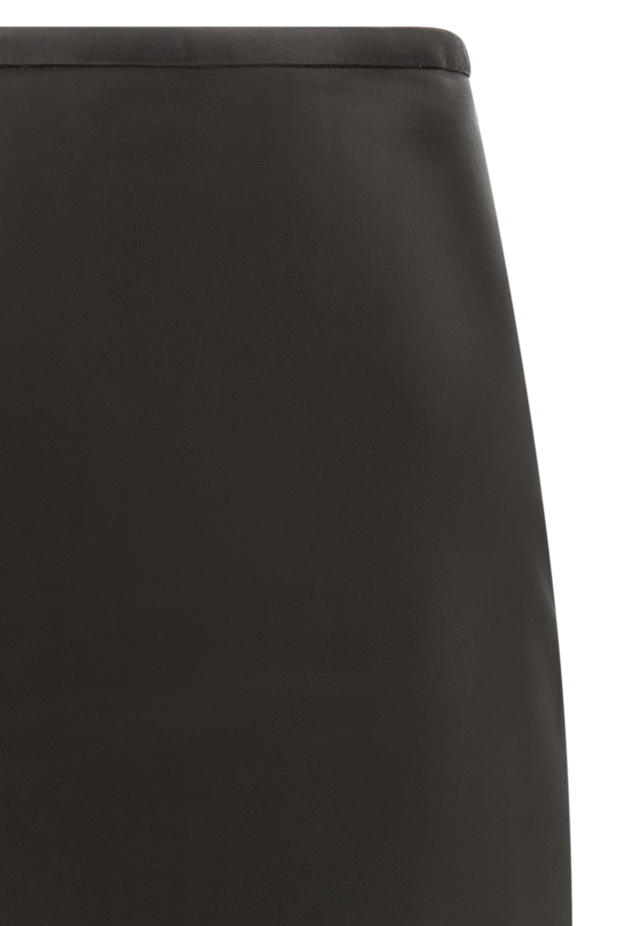 the pencil skirt co redefines the codes of tailoring through an elongated and ri