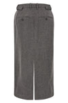 the co longuette skirt embodies rigorous elegance through a structured silhouett