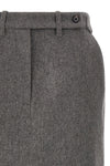 the co longuette skirt embodies rigorous elegance through a structured silhouett