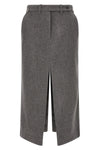 the co longuette skirt embodies rigorous elegance through a structured silhouett