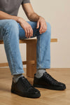 louis junior spikes flat leather sneakers