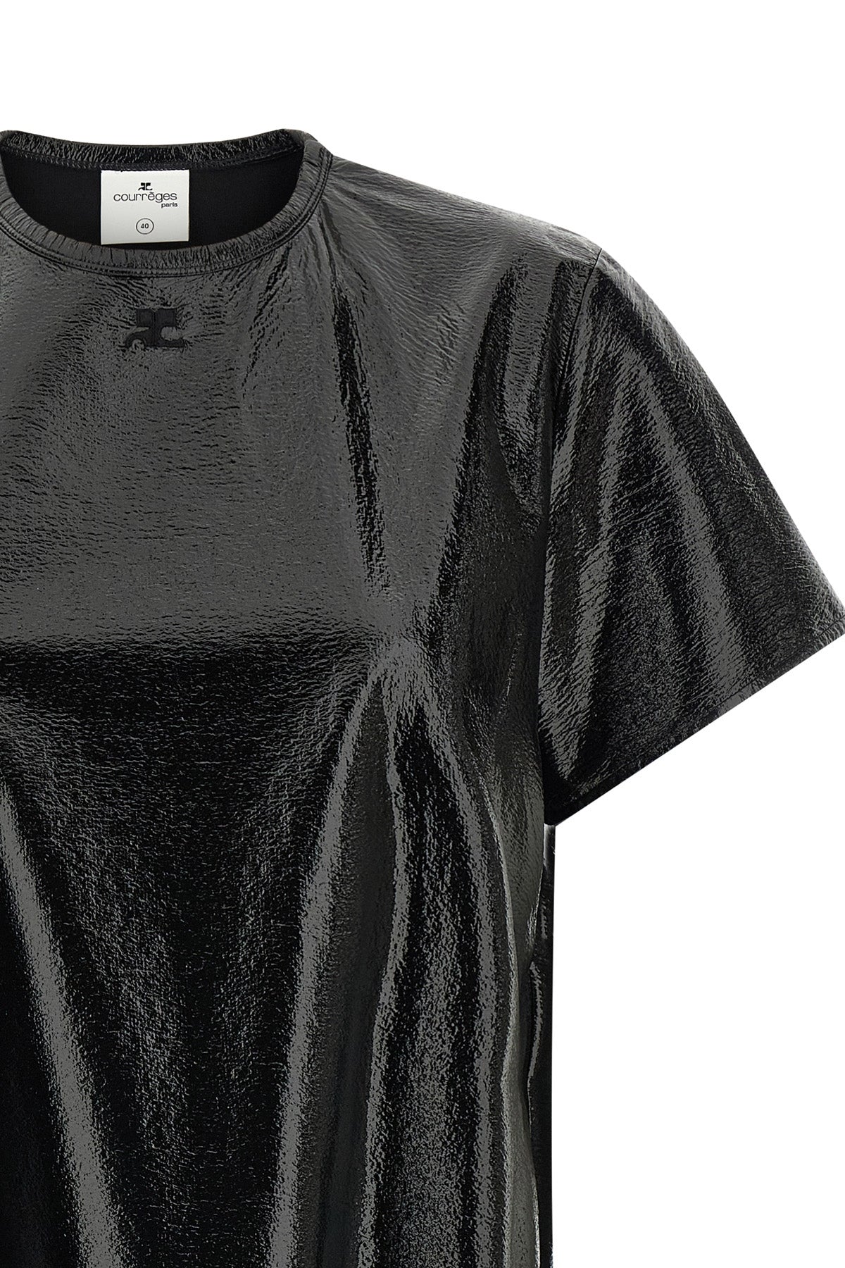 the mini dress courrèges defines an essential silhouette through a rigorous t-sh