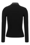 the black ribbed jersey courrèges defines a tight and sculptural silhouette