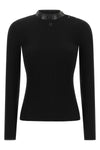the black ribbed jersey courrèges defines a tight and sculptural silhouette