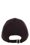 the courrèges ac logo baseball cap redefines the casual aesthetic through a ri