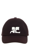 the courrèges ac logo baseball cap redefines the casual aesthetic through a ri