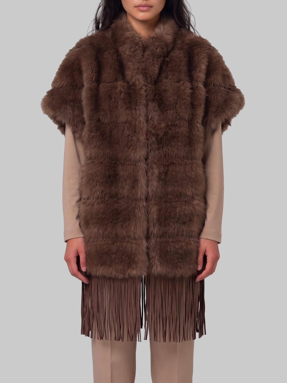 UNCOMMON 42 faux fur cape with fringe