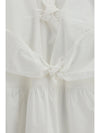 mini dress with a deep v-neckline and front tie bands