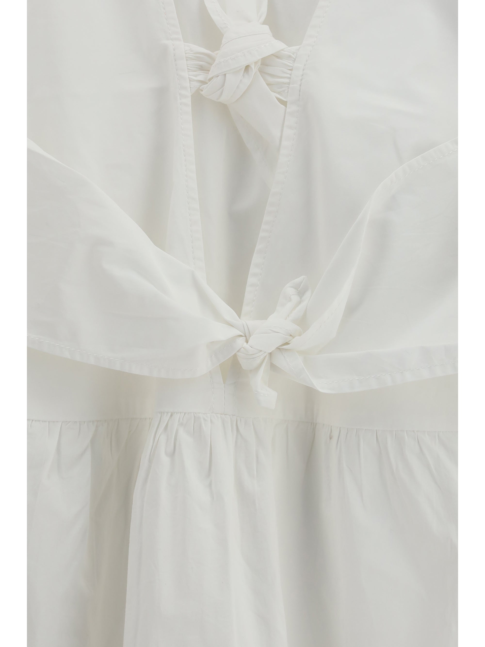 mini dress with a deep v-neckline and front tie bands