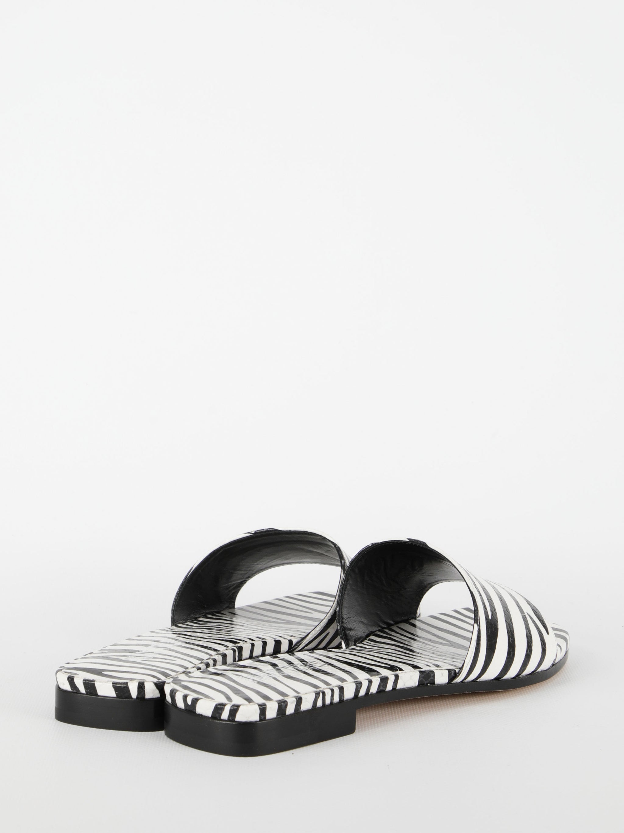 zebra-print flat sandals