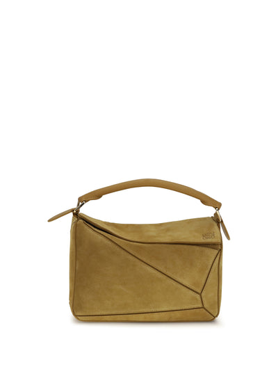small featherlight puzzle suede handbag