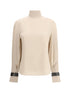 BRUNELLO CUCINELLI S silk turtleneck blouse with precious bracelets