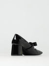 woman's high heel shoes