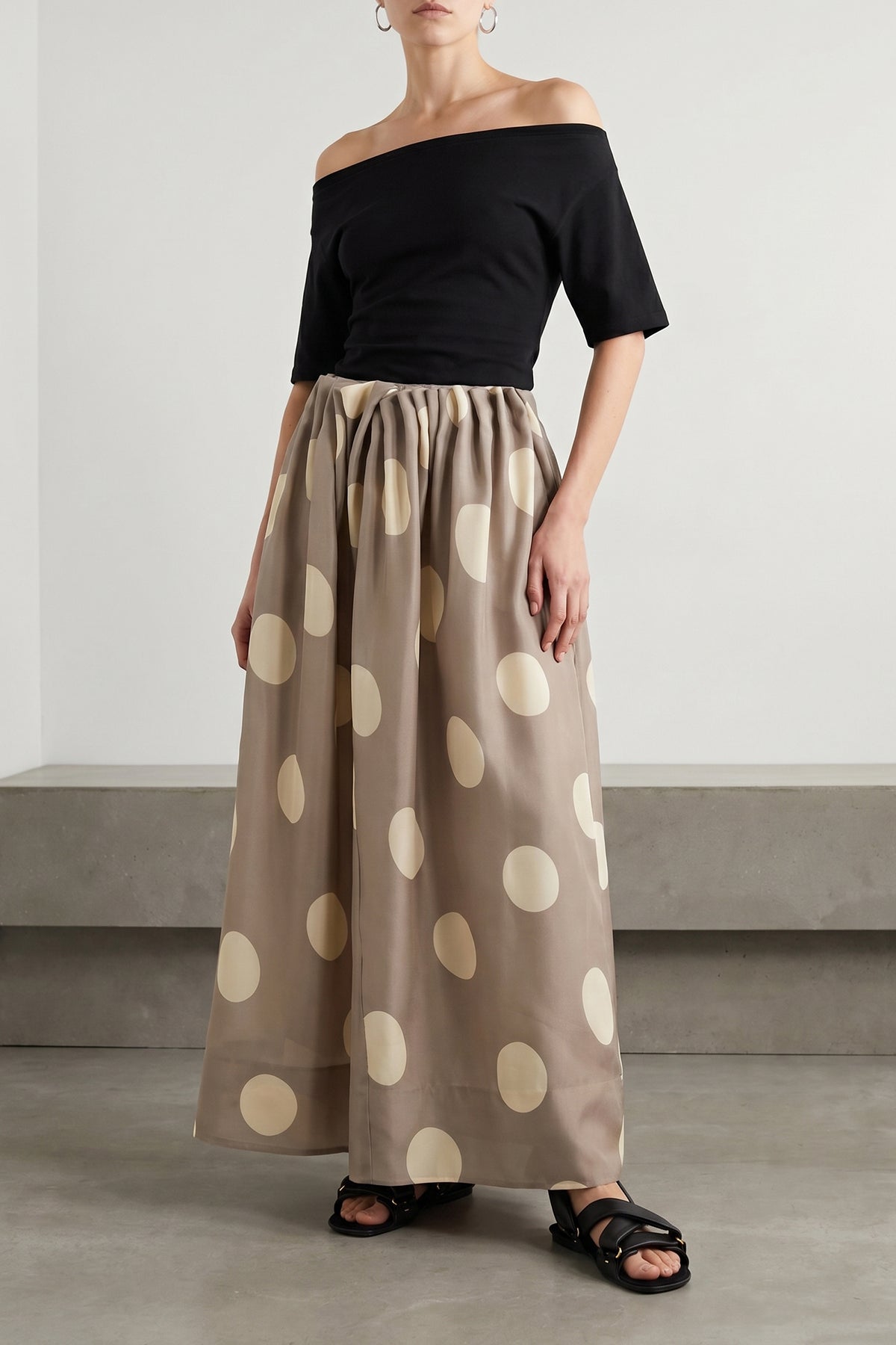 the khaite riley maxi skirt imposes a scenographic presence through a masterfu