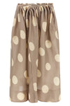 the khaite riley maxi skirt imposes a scenographic presence through a masterfu