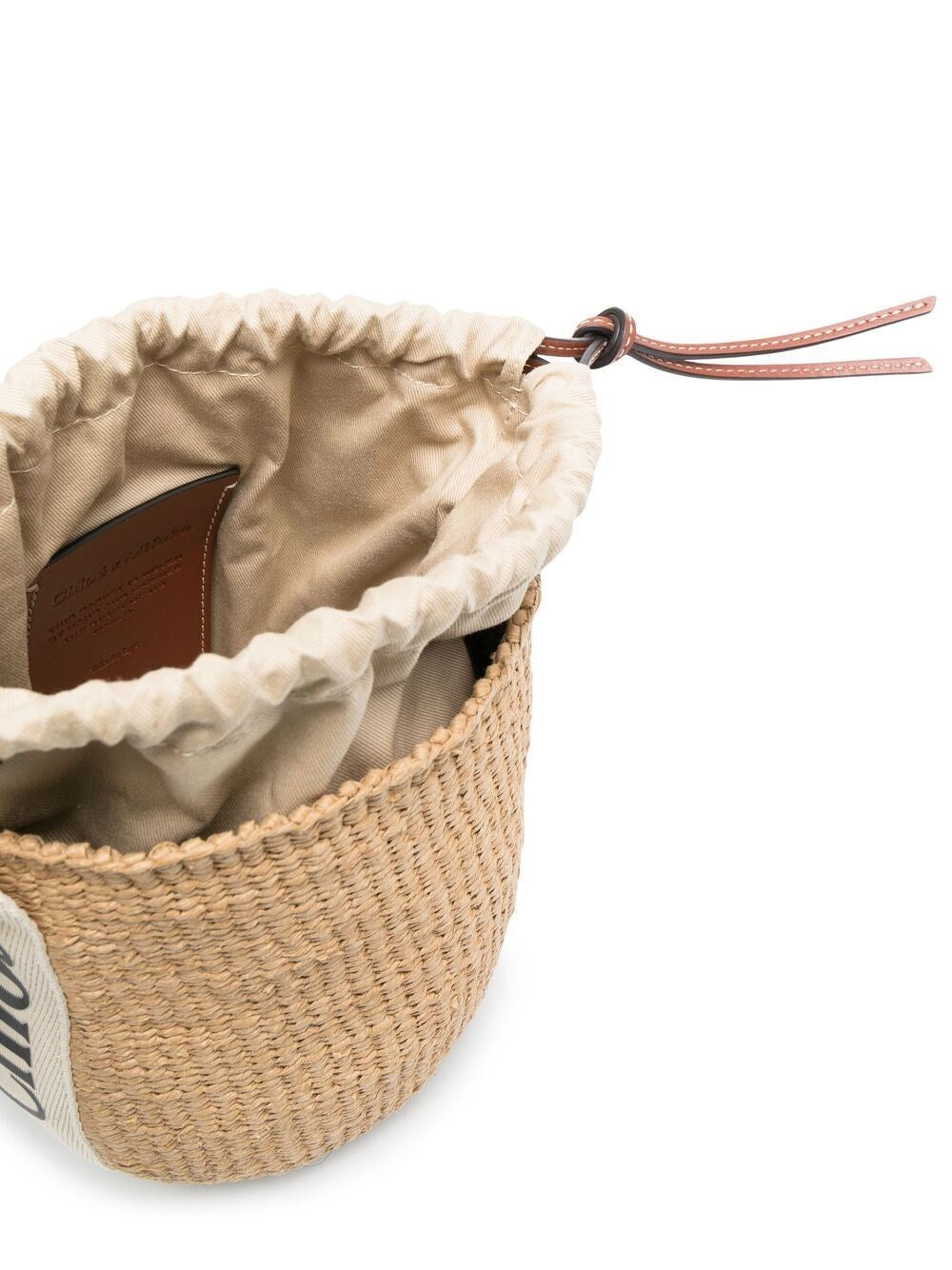 small woody basket in natural fibers