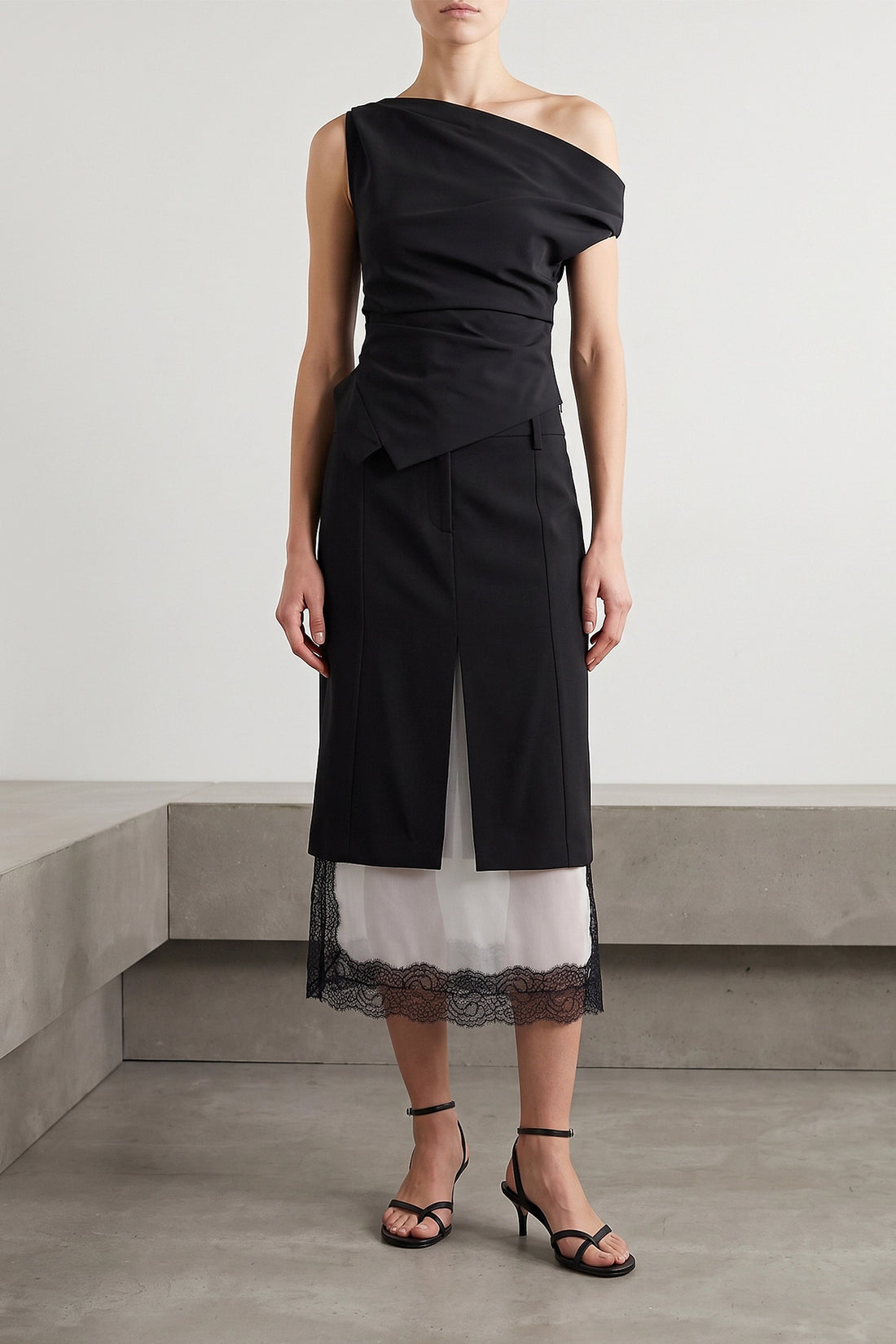 ROHE 34 the rohe top redefines modern tailoring through an asymmetrical silhouette of gr