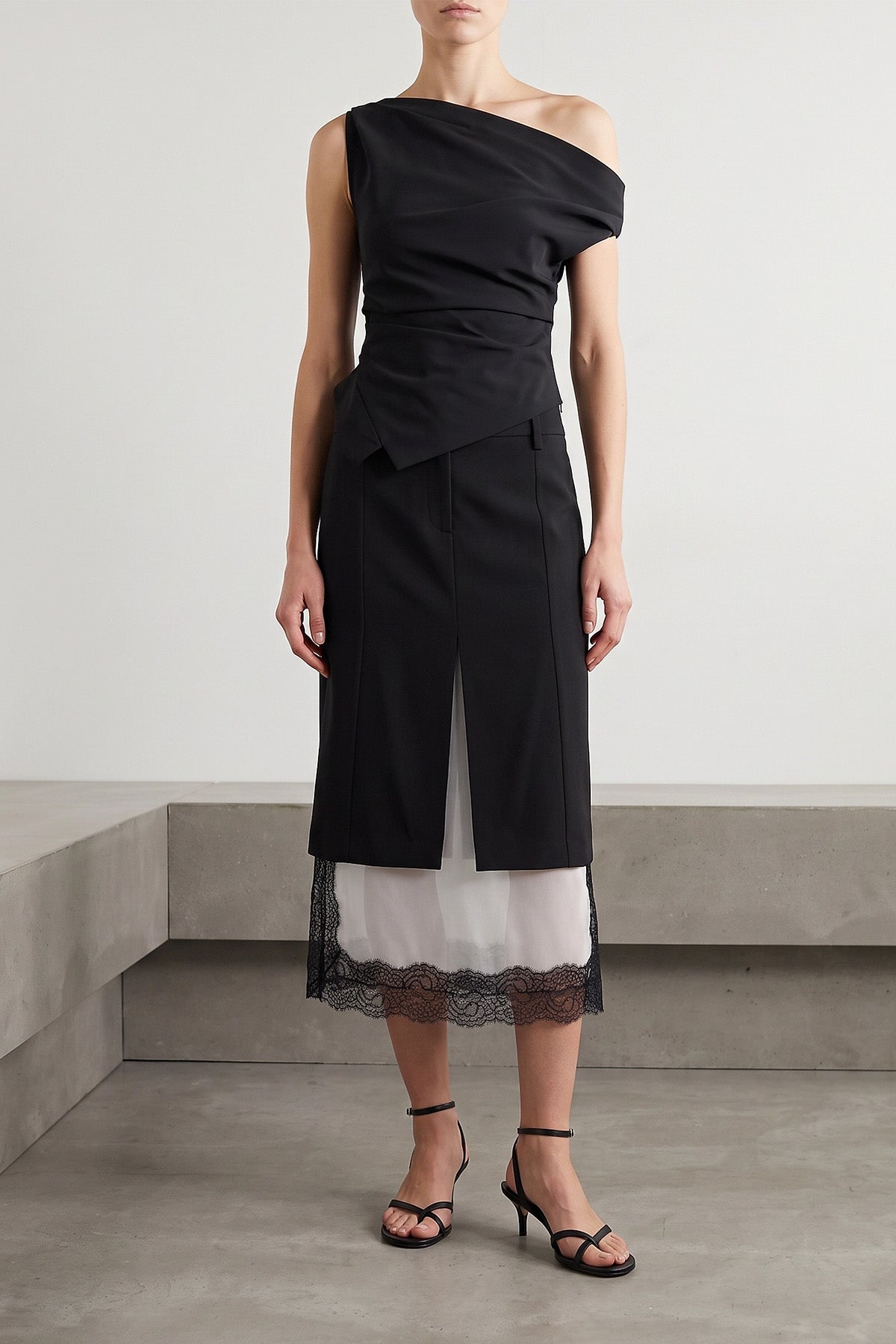 the rohe top redefines modern tailoring through an asymmetrical silhouette of gr
