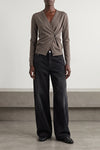 the rohe twisted ballet cardigan redefines knitwear through a precise asymmetric