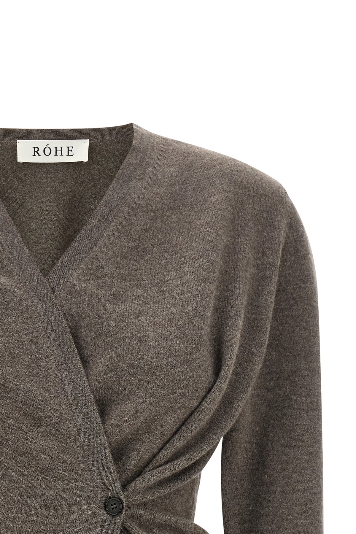 the rohe twisted ballet cardigan redefines knitwear through a precise asymmetric