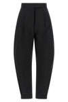rohe tailored trousers redefine the codes of tailoring through a silhouette