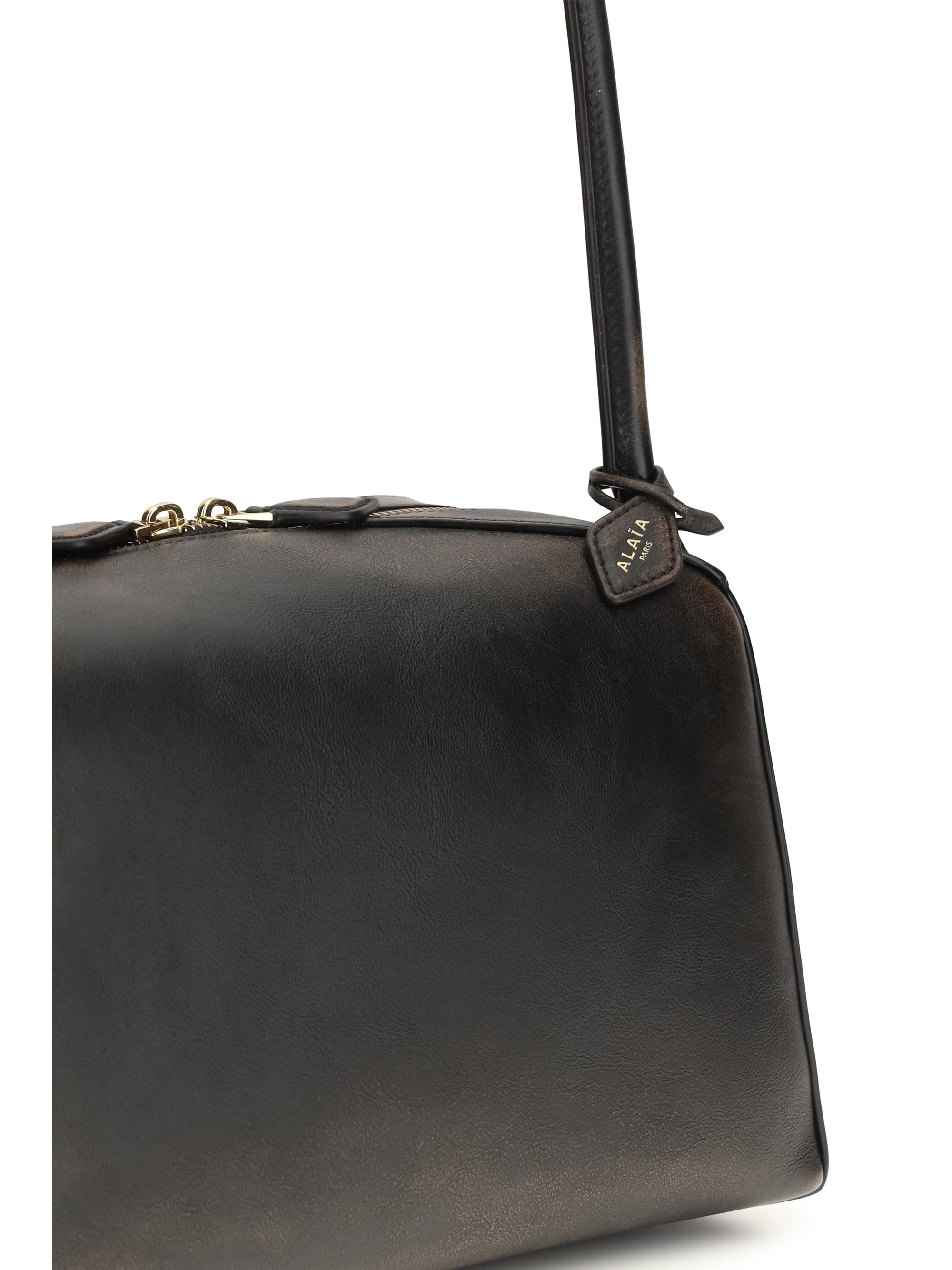 le bouledogue shoulder bag in aged leather