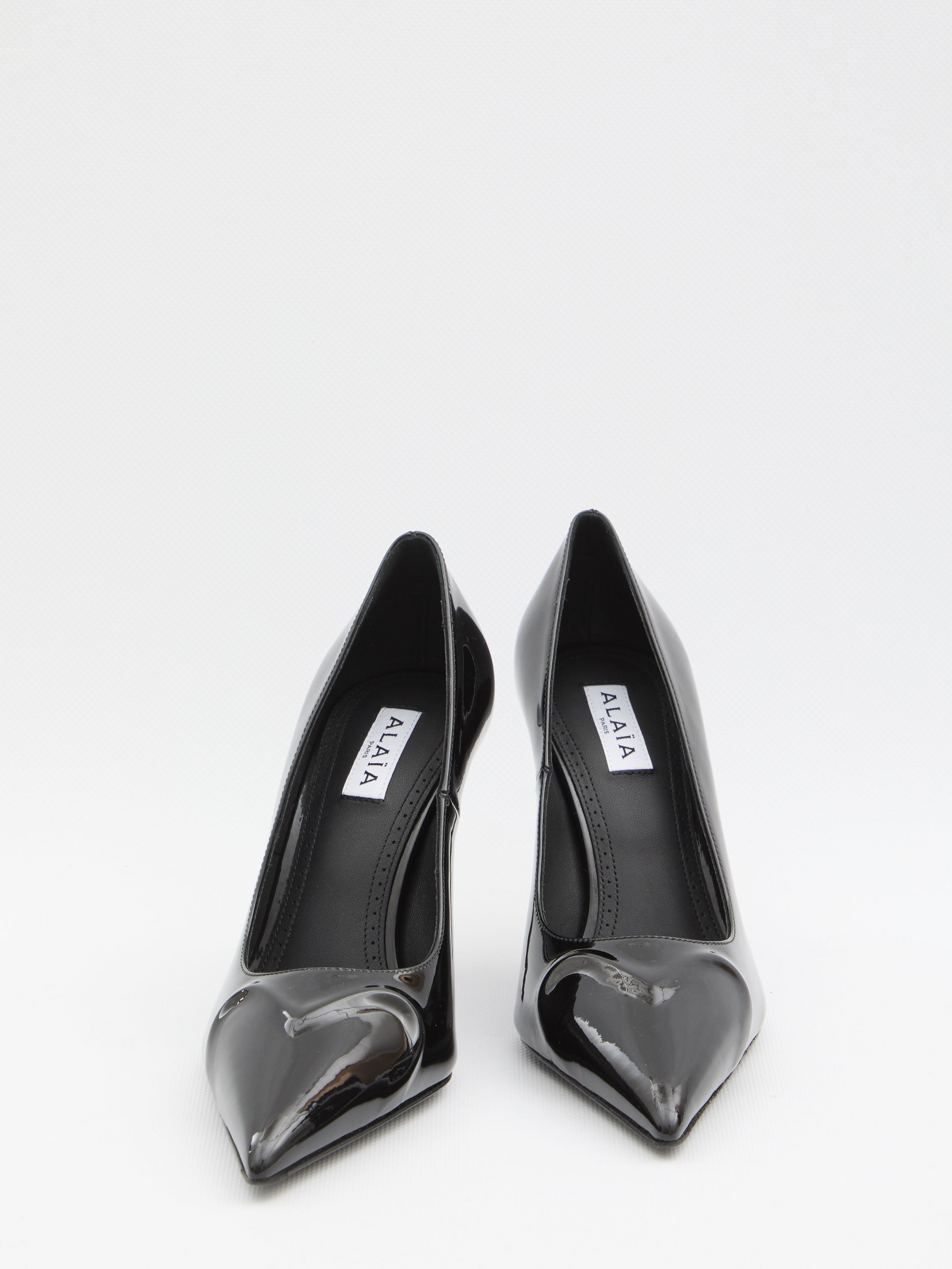 ALAIA 36 black patent pumps 