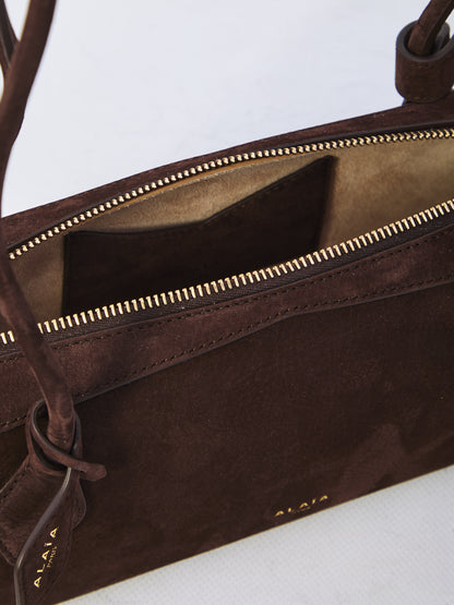 ALAIA OS le teckel medium bag in nubuck