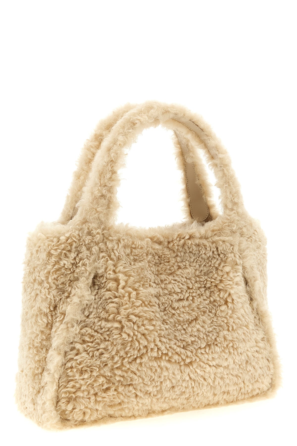 the stella mccartney eco sheepskin tote bag stands out for its soft and unstruct