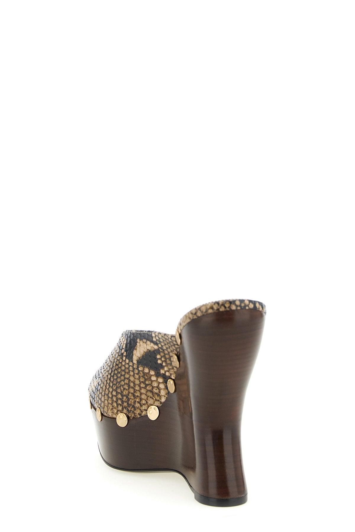 the magda butrym re26 python print mules wedges redefine the classic silhouette