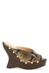 the magda butrym re26 python print mules wedges redefine the classic silhouette